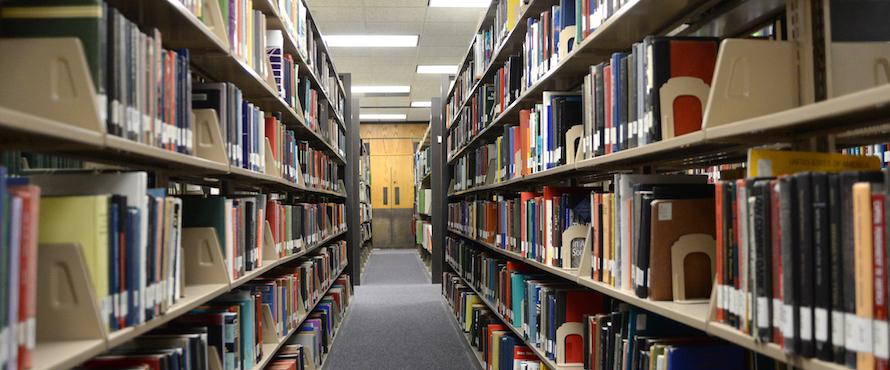 Photo of the book stacks at Northeastern's Ronald Williams Library