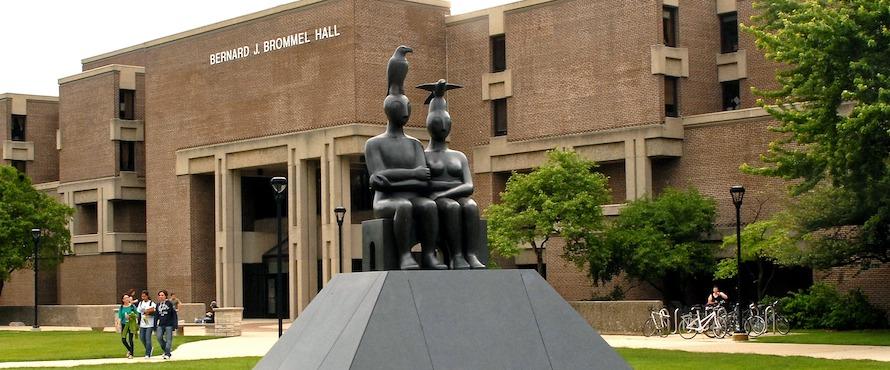 The northern exterior and entrance of Bernard Brommel Hall with the "Serenity" sculpture in the foreground