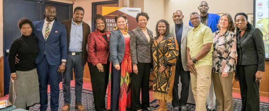 A photo of Northeastern President Gloria J. Gibson (center) with members of the GHRAD Center staff and research team at the 2019 Genocide and Human Rights in Africa and the Diaspora Conference