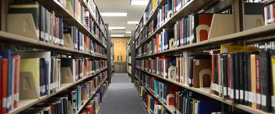 A photo of book stacks at an NEIU library