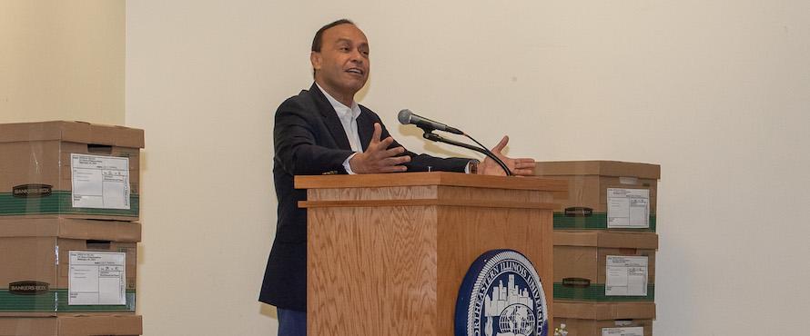 Former U.S. Rep. Luis V. Gutiérrez presenting boxes of materials for his Congressional Archives to Northeastern Illinois University in 2018. 