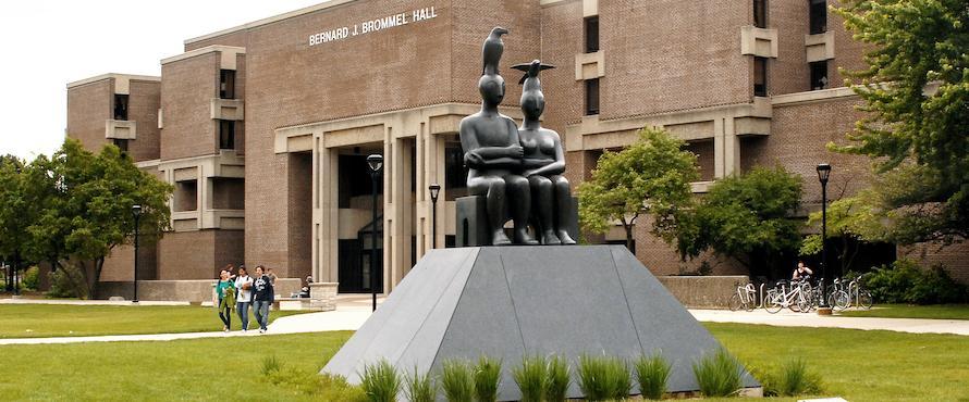 Photo of the "Serenity" statue with Bernard Brommell Hall in the background.