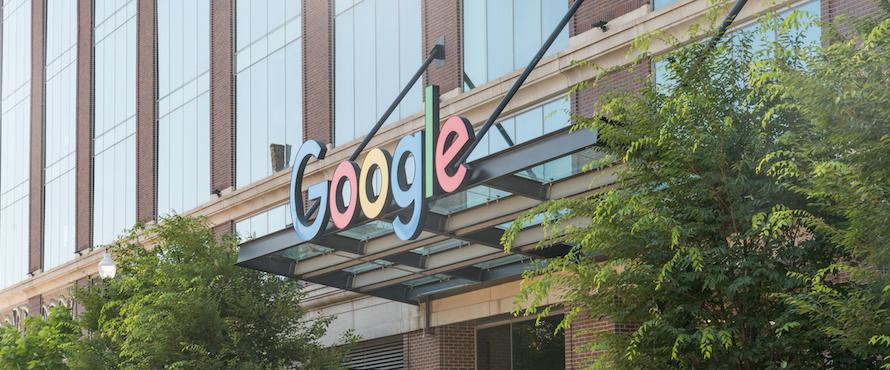 The word Google displayed in colorful letter on the exterior of a building