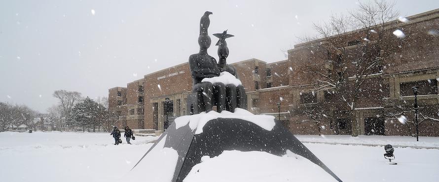 Ruth Duckworth's Serenity sculpture sits dusted with snow to the north of Bernard Brommel Hall