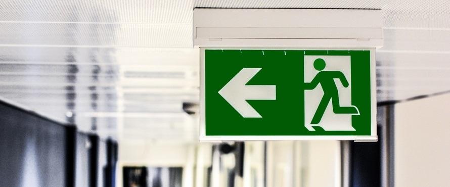 Emergency sign that points to exits