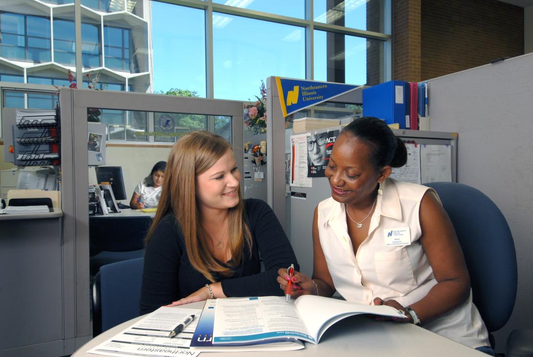 Admissions representative answering questions