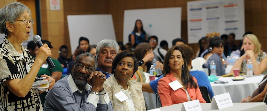 A panel of cancer survivors and caregivers speak during a ChicagoCHEC event. 