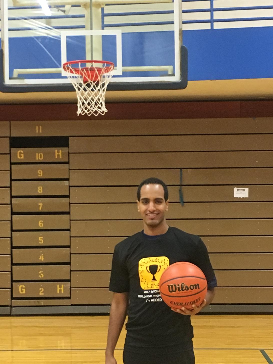 Basketball Player holding basketball