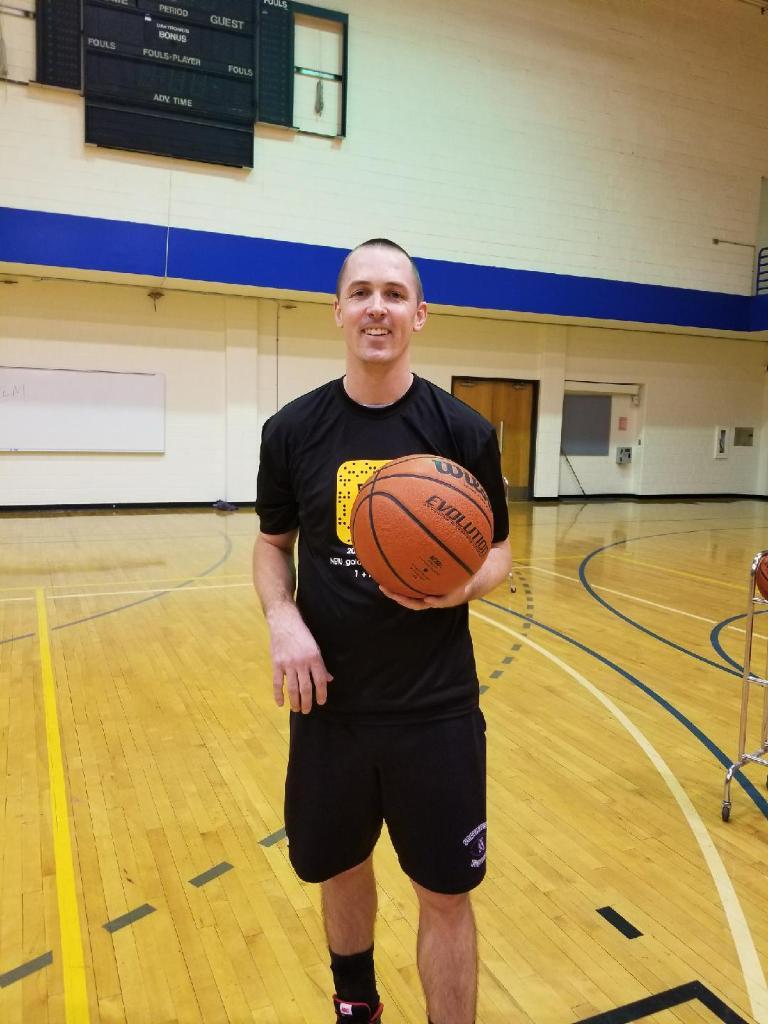 Basketball Player holding basketball