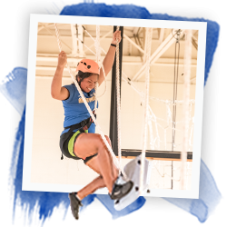 NEIU student on the high ropes at the university fitness center