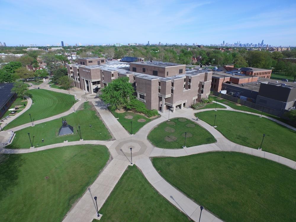Aerial view of Bernard Brommel Hall with Chicago skyline on the horizon