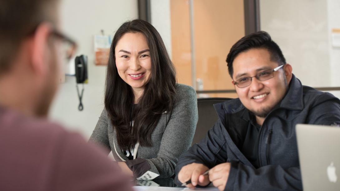Two students seated in a classroom