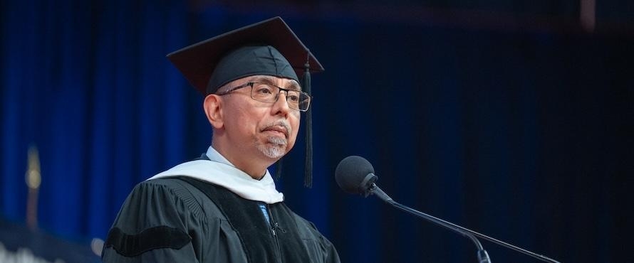 Eduardo “Eddie” Bocanegra speaking at Commencement