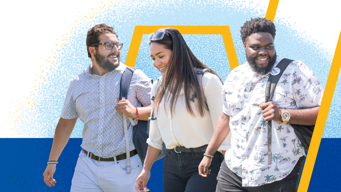 Three students walking and laughing