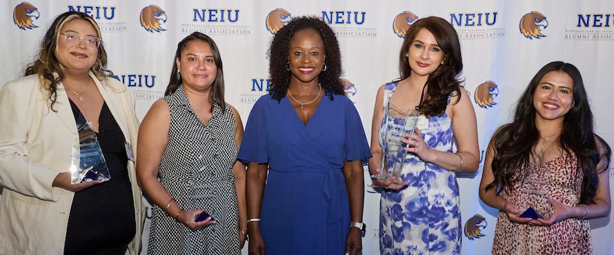 A photo of the Northeastern Illinois University 2026 Alumni Award recipients with President Bell Jordan (from left to right): Cassaundra Garcia, Jennifer Franco, Katrina E. Bell-Jordan, PJ Randhawa, Aidé Hernández. Rogelio Villa Jr. is not pictured.