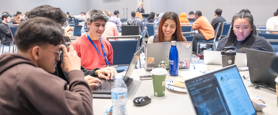 A photo of Northeastern Illinois University students participating in the Computer Science Hackathon.