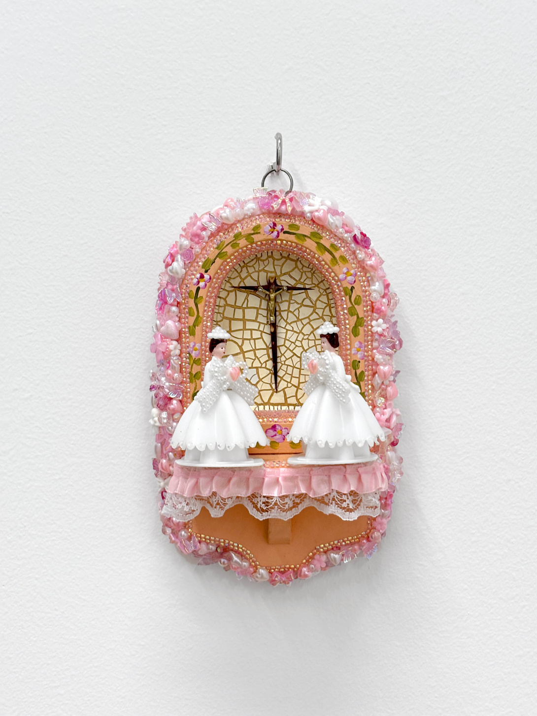Assemblage of two brides by Marylu E. Herrera