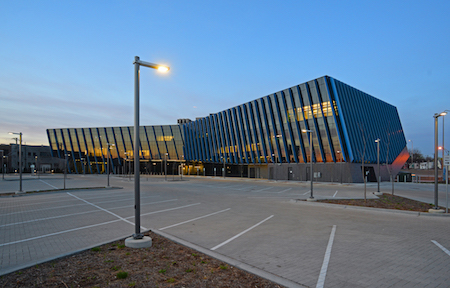 The El Centro building is shown at dusk.