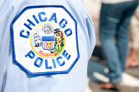 A Chicago Police Department patch is shown on a uniform.