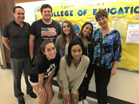 Five Ridgewood High School students and Dean Sandra Beyda-Lorie