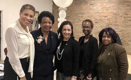 President Gibson (second from left) with (from left) Carruthers Center Director Andrea Evans, Executive Director of Government Relations Suleyma Perez, Director of Scholarships Michelle Morrow and Director of Financial Aid Maureen Amos