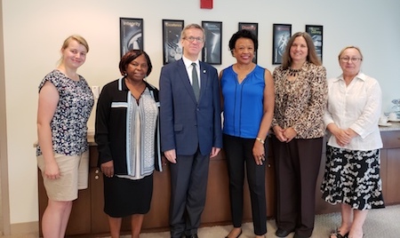 From left: Monica Prokop, Wamucii Njogu, Jacek Prokop, Gloria Gibson, Cris Toffolo and Lidia Filus stand in the President's Conference Room.