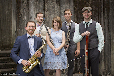 The Akropolis Reed Quintet pose with their instruments